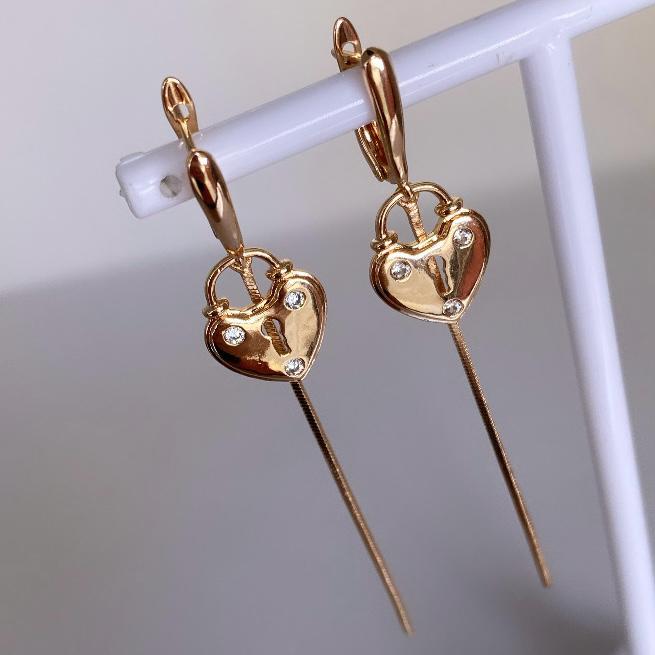 Aretes Colgantes Llave del Corazón